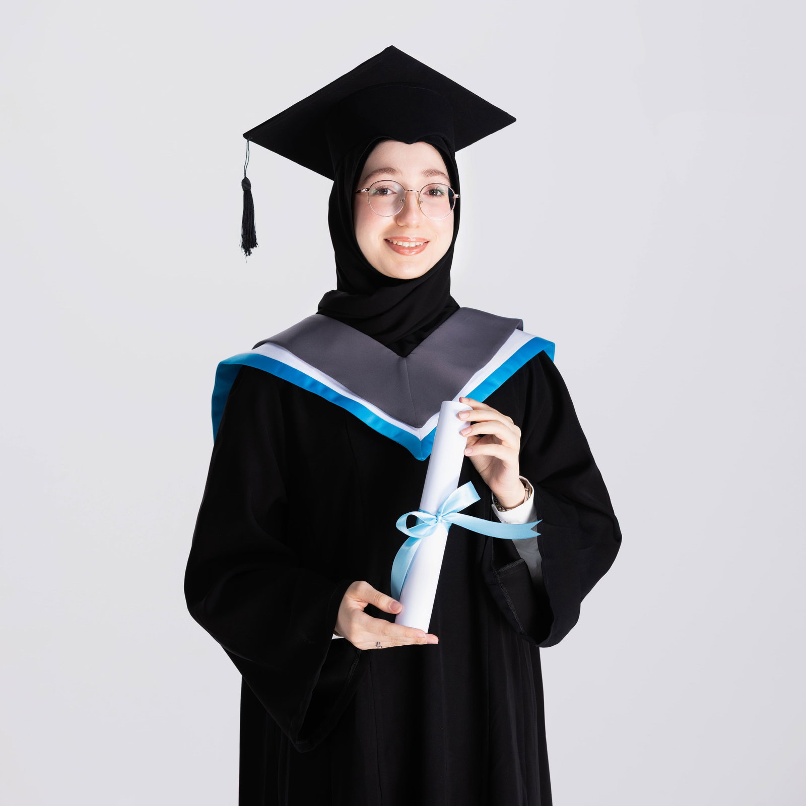young-graduate-student-making-thumbs-up-white